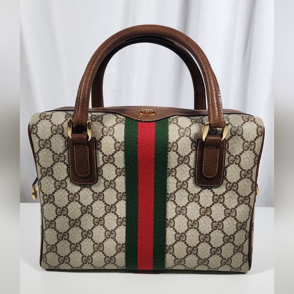 Gucci Ophidia 2 way with original strap. Slight discoloration on shoulder strap.